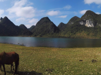 碧波荡漾，峰峦垂悬，靖西市和德保县共同的骄傲，念诺湖（念诺水库）风光。