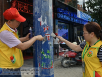 靖西整治城市小广告不让“牛皮癣”遮脸