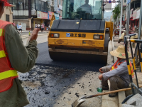 靖西城西路修路进程，压柏油咯