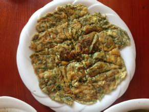 靖西传统风味小吃——水草煎蛋 - 靖西网