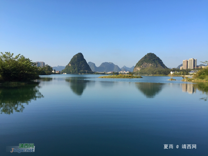 水光潋滟晴方好，山色空蒙雨亦奇。若将龙潭西湖比，晴天雨天总相. - 靖西网