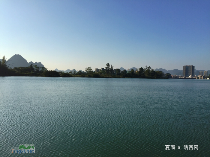 水光潋滟晴方好，山色空蒙雨亦奇。若将龙潭西湖比，晴天雨天总相. - 靖西网