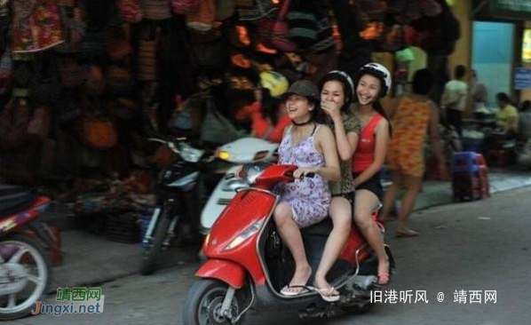 越南女孩都愿意坐在摩托车上笑，个个美丽 - 靖西网